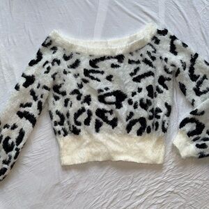 Fuzzy white and black cheetah off-shoulder sweater